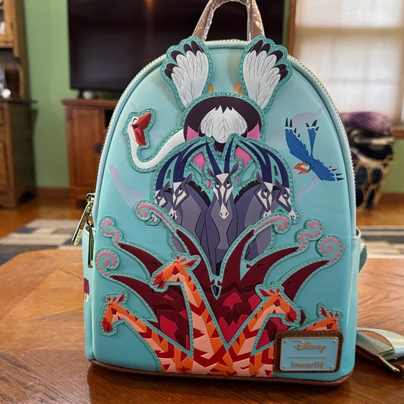 Loungefly Handbags - Loungefly Aqua Lion King Duo Mini Backpack